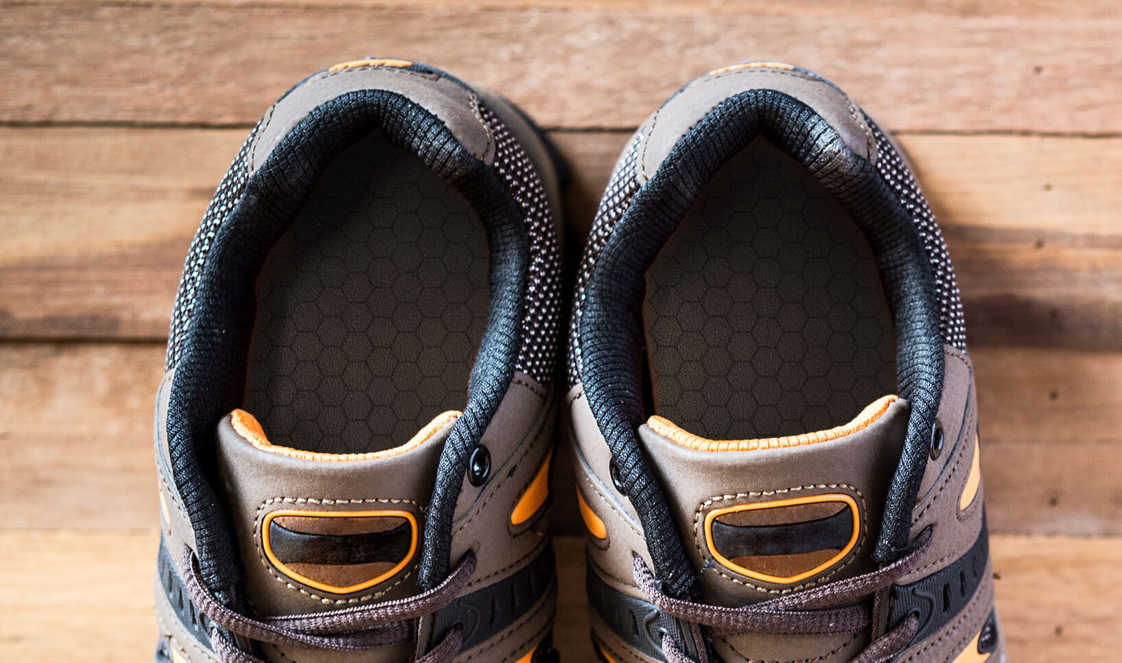 closeup of shoes on wooden background